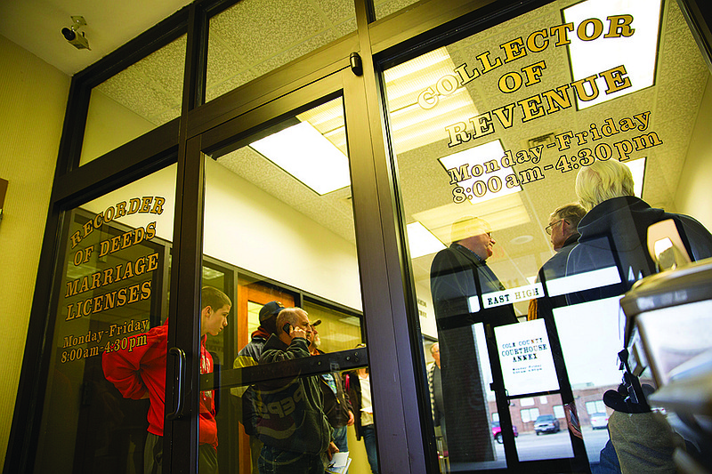 Long lines filled the first floor of the Courthouse Annex Building on High Street on Monday afternoon as people waited to pay their property taxes before the end of the year.