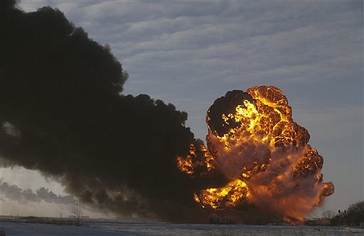 A fireball goes up Monday at the site of an oil train derailment in Casselton, N.D. The train carrying crude oil derailed near Casselton Monday afternoon. Several explosions were reported as some cars on the mile-long train caught fire.