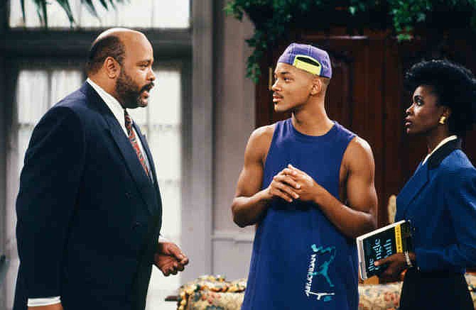 This photo provided by NBC shows, from left, James Avery as Philip Banks, Will Smith as William "Will" Smith, and Janet Hubert as Vivian Banks, in episode 7, "Def Poet's Society" from the TV series, "The Fresh Prince of Bel-Air." Avery, 65, the bulky character actor who laid down the law as the Honorable Philip Banks has died. Avery's publicist, Cynthia Snyder, told The Associated Press that Avery died Tuesday, Dec. 31, 2013. 