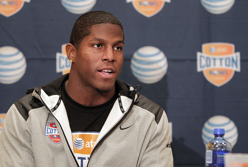 Missouri junior defensive lineman Kony Ealy speaks to the media during an NCAA college football news conference, Wednesday, Jan. 1, 2014, in Irving, Texas.