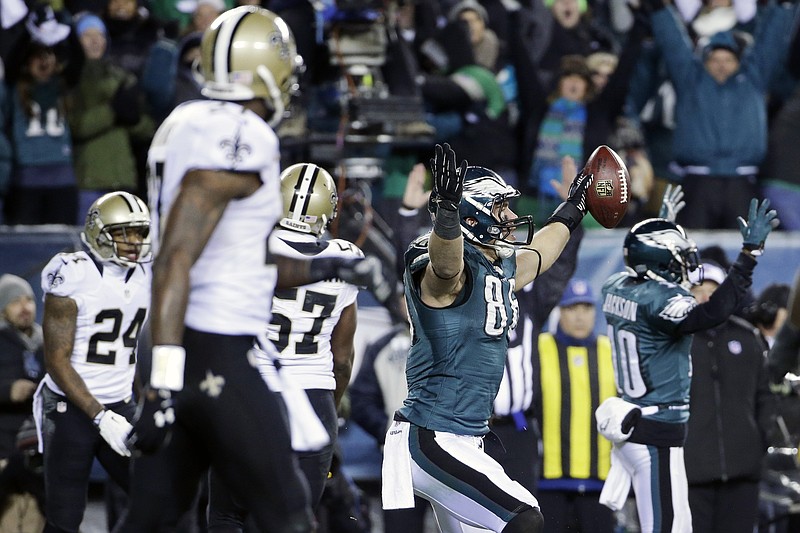 Philadelphia Eagles' Zach Ertz (86) celebrates after scoring a touchdown during the second half of an NFL wild-card playoff football game against the New Orleans Saints, Saturday, Jan. 4, 2014, in Philadelphia.