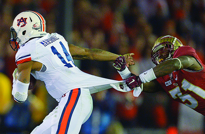 Florida State's Terrence Brooks tries to tackle Auburn's Nick Marshall during the second half of the BCS National Championship game Monday night in Pasadena, Calif.