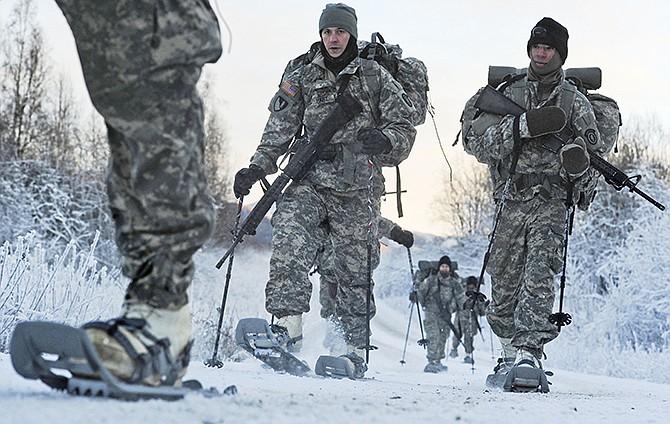 Soldiers assigned to 6th Engineer Battalion utilize snow shoes during Arctic Light Individual Training on the Bulldog Trail in sub-zero conditions at Joint Base Elmendorf-Richardson, Alaska.