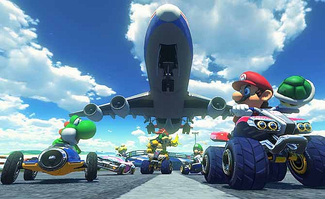 This photo provided by Nintendo shows a scene from the video game, "Mario Kart 8."