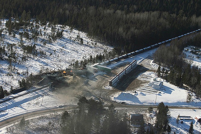 A Canadian National Railway freight train carrying crude oil and propane derailed Tuesday night in a sparsely populated region of northwestern New Brunswick. More than 100 residents remained evacuated from their homes. There were no deaths or injuries.