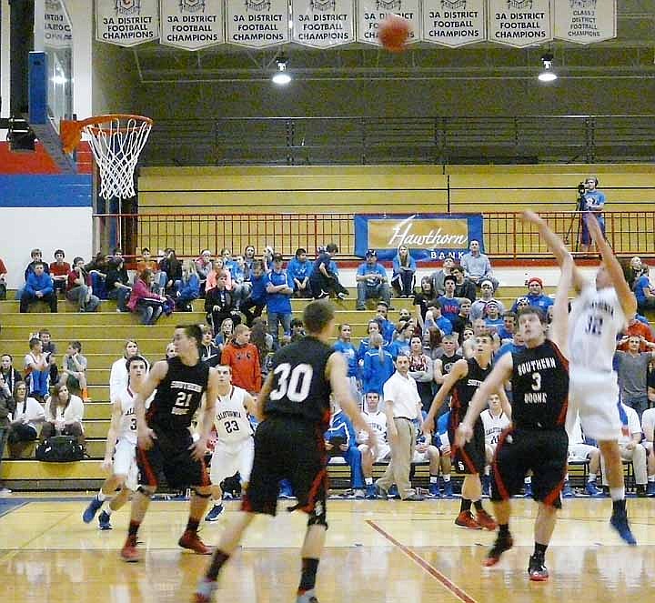 California's Dylan Albertson (#32) shoots high Friday night scoring 2 of his 13 points for the Pintos.