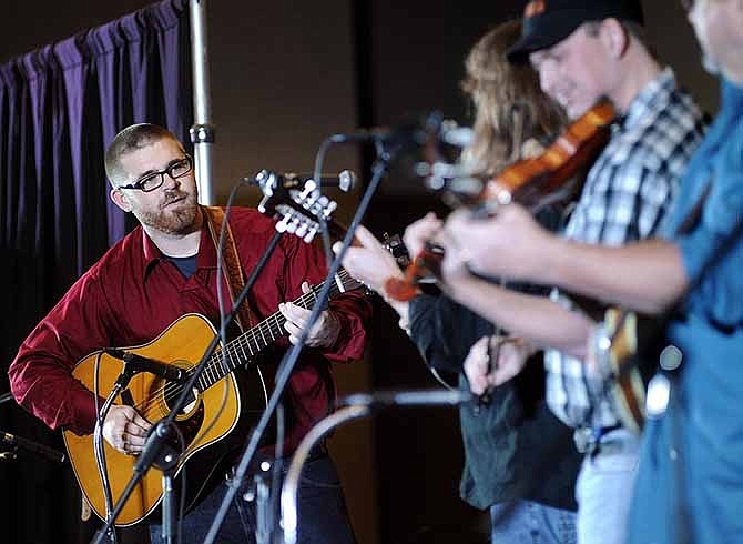Kevin Strouth performs Saturday afternoon with Nothin' Fancy at the Bluegrass Music Awards at Capitol Plaza in Jefferson City. This weekend was Strouth's first time performing with the band.