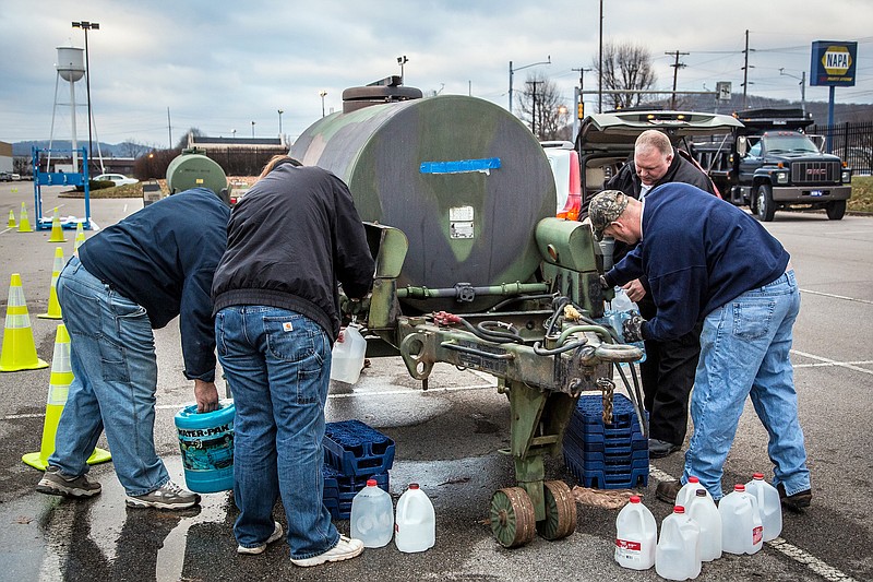 Local residents in Charleston, W.V., continue to arrive at distribution centers to load up on bottled water Sunday after a chemical spill Thursday in the Elk River that has contaminated the public water supply in nine counties. Frustration is mounting for many of the 300,000 West Virginia residents who've gone three days without clean tap water. 
