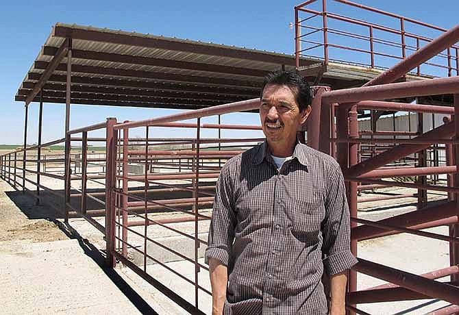  In this April 15, 2013, file photo, Valley Meat Co. owner, Rick De Los Santos stands in a corral area outside the former cattle slaughterhouse he has converted to a horse slaughter facility in Roswell, N.M. 
