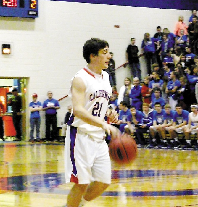 California's Jerry Lutz brings the ball down for the Pintos during the varsity game against Southern Boone Friday night at California High School. The Pintos defeated the Eagles 72-47.
