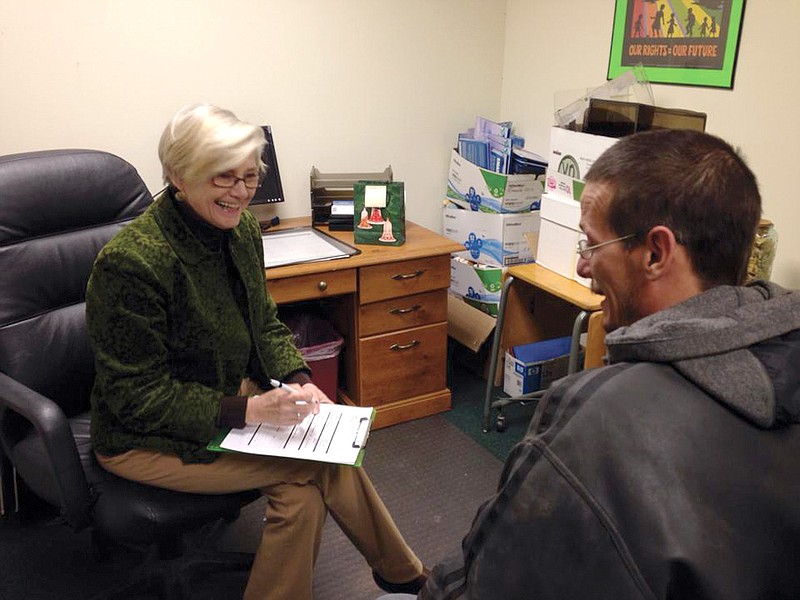 Callaway Keys volunteer Jean Collins meets with a client at the Central Missouri Community Action offices in Fulton Thursday. Collins and six other retired teachers and administrators work with unemployed residents of Callaway County on various skills to help them find a job.