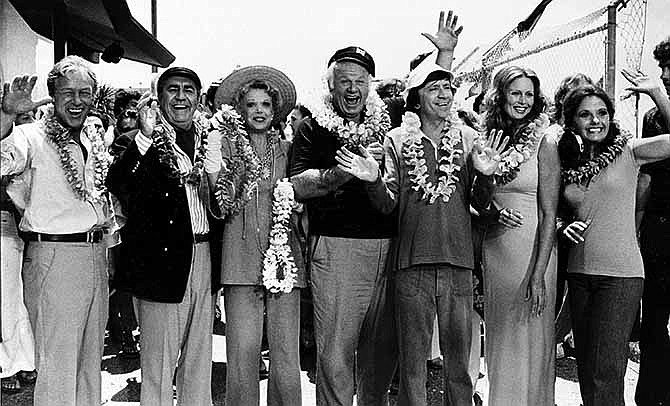 This Oct. 2, 1978 file photo shows the cast of "Gilligan's Island," from left, Russell Johnson, as the professor; Jim Backus as Thurston Howell III; Natalie Schafer, as Mrs. Howell III; Alan Hale Jr., as the skipper; Bob Denver, as Gilligan; Judith Baldwin replacing original cast member Tina Louise, as Ginger, and Dawn Wells, as Mary Ann, posing during filming of a two-hour reunion show, "The Return from Gilligan's Island," in Los Angeles. Johnson died Thursday, Jan. 16, 2014, at his home in Washington State of natural causes. He was 89.