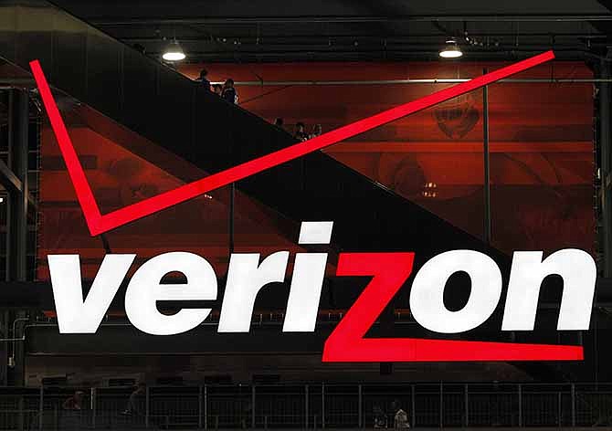  In file photo taken Aug. 21, 2010, a Verizon sign is shown at New Meadowlands Stadium in East Rutherford, N.J. 