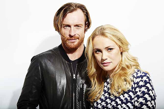 This Oct. 15, 2013 photo shows Toby Stephens, left, and Hannah New, from the new Starz original series, "Black Sails," in New York. The series premieres Saturday, Jan. 25.