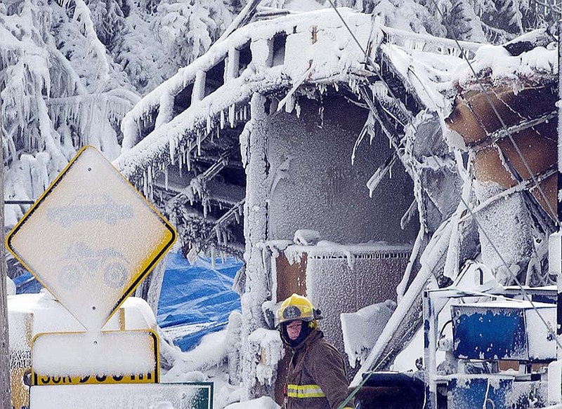 Emergency workers resume the search for victims at a fatal seniors residence fire on Sunday in L'Isle-Verte, Quebec. 
