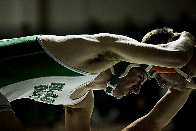Blair Oaks wrestler Ben Campbell grapples with opponent Kyle Thomas of Knob Noster during a dual match Tuesday evening at Blair Oaks.