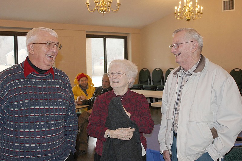 
Outgoing Fulton Housing Authority Deputy Director Bruce Carpenter, left, visits with friends Judy and Bill Vieth during his retirement reception Friday afternoon. Carpenter has worked at the housing authority for 14 years.