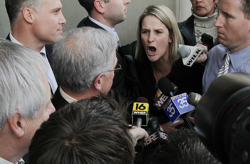 Sandy Fonzo of Wilkes-Barre, right, confronts former Luzerne County Judge Mark A. Ciavarella Jr., as he leaves the federal courthouse in Scranton, Pa. in 2011. Fonzo's son, who was jailed when he was 17 by Ciavarella, committed suicide at the age of 23. The film "Kids for Cash" set to open Wednesday in Philadelphia before opening in theaters nationwide, explores the scandal that entangled thousands of children in Pennsylvania's juvenile court system and sent two former judges to prison.