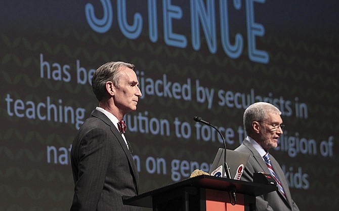 Creation Museum head Ken Ham, right, speaks during a debate on evolution with TV's "Science Guy" Bill Nye, at the Creation Museum Tuesday,  in Petersburg, Ky. Ham believes the Earth was created 6,000 years ago by God and is told strictly through the Bible. Nye says he is worried the U.S. will not move forward if creationism is taught to children. 