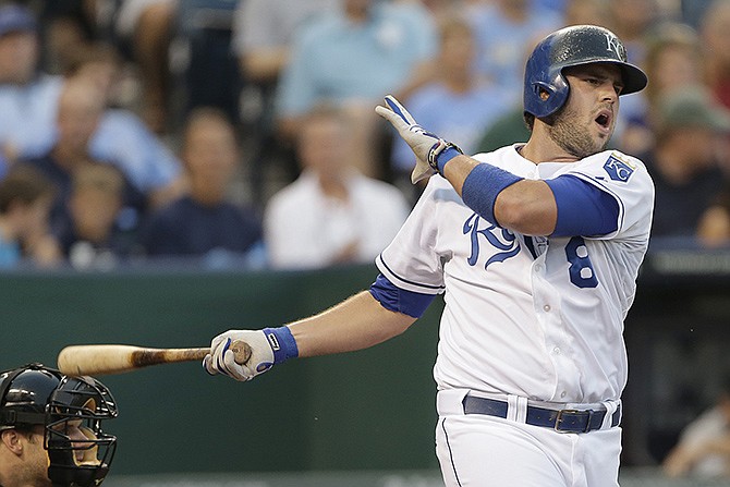 In this Aug. 21, 2013, file photo, the Royals' Mike Moustakas bats against the White Sox in Kansas City. Moustakas is looking to bounce back from a tough season.