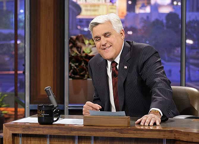 This Nov. 5, 2012 photo released by NBC shows Jay Leno, host of "The Tonight Show with Jay Leno," on the set in Burbank, Calif. After 22 years, Leno will host his last show on Thursday, Feb. 6, 2014. Jimmy Fallon starts his NBC "Tonight Show" on Feb. 17, 2014, from New York. 