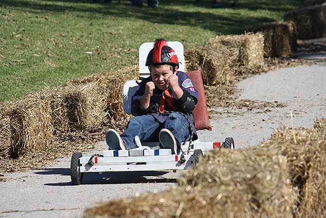 Devin Dippold from Pack 96 Tiger Den shows his enthusiasm at the mobile race in October. 