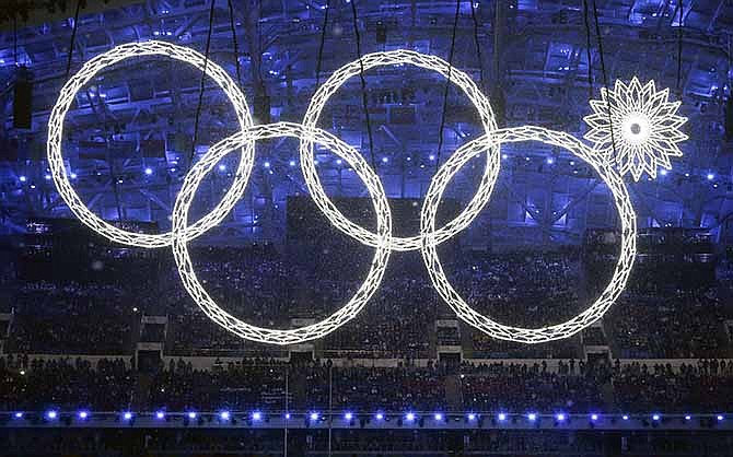 One of the rings forming the Olympic Rings fails to open during the opening ceremony of the 2014 Winter Olympics in Sochi, Russia, Friday, Feb. 7, 2014.
