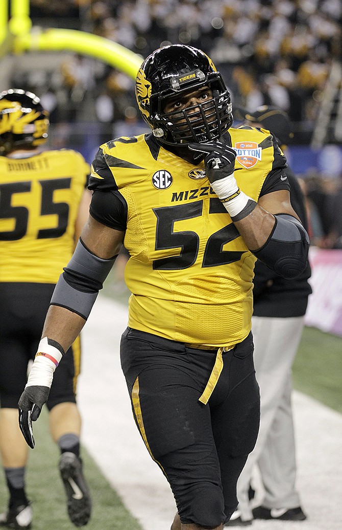 Missouri defensive end Michael Sam, the co-Southeastern Conference Defensive Player of the Year, announced he was gay Sunday night. 