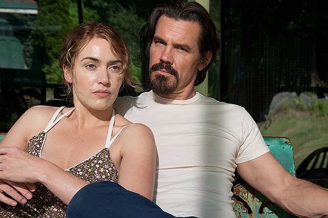 This image released by Paramount Pictures shows Kate Winslet, left, Josh Brolin in a scene from "Labor Day." 