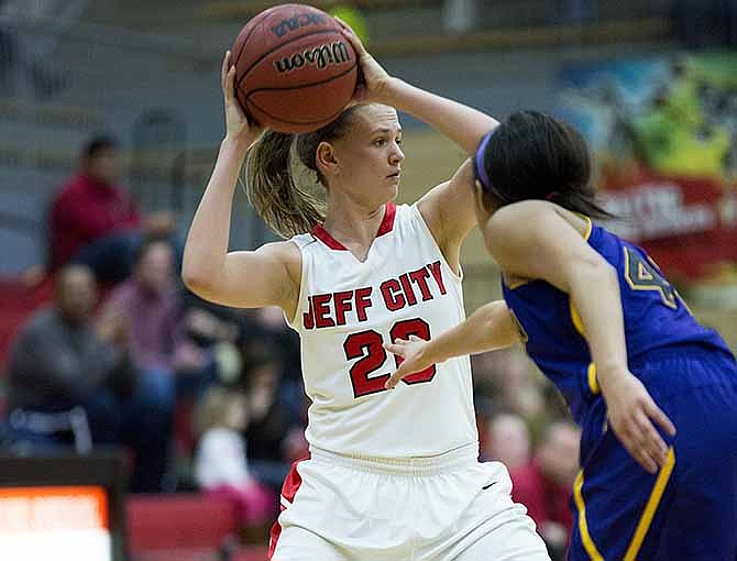 Jefferson City guard Kaley Ruff looks to pass during the Lady Jays' matchup against the Hickman Kewpies on Tuesday night at Fleming Fieldhouse.