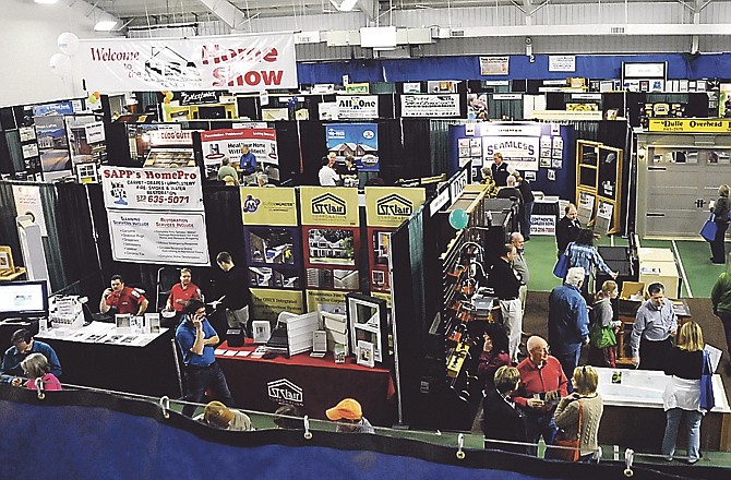 Exhibitors at the Home Builders Association's Home Show are seen in this Feb. 21, 2011, file photo.
