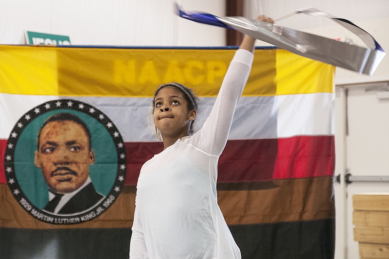 FILE: A young performer with the praise team Divine Purpose twirls a ribbon in the air Sunday during the 2014 Fulton NAACP Dr. Martin Luther King Jr. and Black History Celebration, "Spirit of Togetherness," at Guiding Light Missionary Baptist Church in Fulton. McBride said the celebration was the 14th the NAACP branch has sponsored.