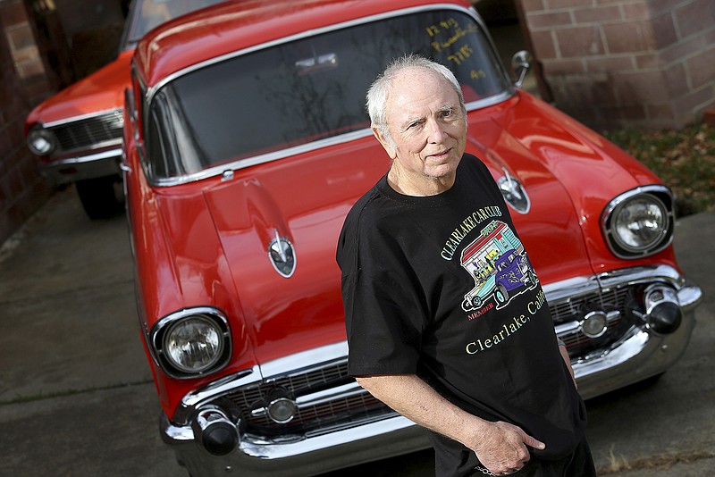 Skip Wilson poses in front of his 1957 Chevrolet Bel Air that was stolen in 1984 and returned to him by the California Highway Patrol last week in Clearlake Oaks, Calif. 
