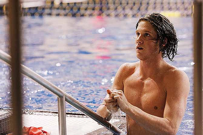 This Feb. 6, 2008 file photo, Greg DeStephens, a sophomore at the University of Missouri Diving team, gets out of the pool after a dive at practice at the University of Missouri, Columbia. DeStephen dealt with being outed as gay, having hostile teammates and diving with a broken back his freshman year, but none of it stopped him from becoming a four-time All-American diver at Missouri. He is also the only Missouri athlete to publicly say he is gay while actively competing 