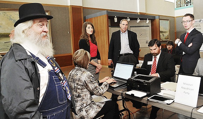 In this Feb. 25, 2014 file photo, perpetual candidate Leonard Steinman waits his turn to file at the Missouri Secretary of State's office to run as a Republican in the 2014 congressional race against Blaine Luetkemeyer. 