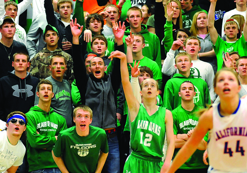 Lauren Viessman of Blair Oaks watches her 3-point attempt in front of the Lady Falcons' student section during Wednesday night's Class 3 District 8 Tournament semifinal against California in Wardsville.