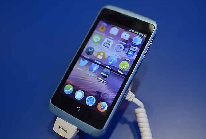 A device is running with Firefox OS software during the Mobile World Congress, the world's largest mobile phone trade show in Barcelona, Spain, Sunday, Feb. 23, 2014.