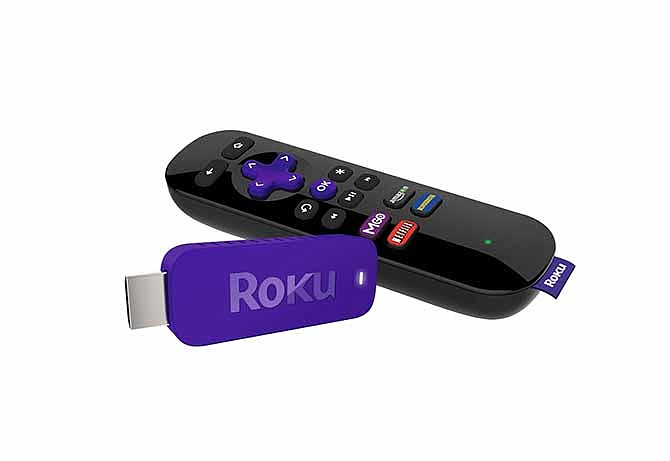 This undated image provided by Roku, shows the Roku Streaming stick. Roku is getting into an Internet video-streaming stick fight with Google's Chromecast.Like the similarly shaped Chromecast, Roku's thumb-sized device plugs into a TV's HDMI port and feeds Internet video through a Wi-Fi connection.