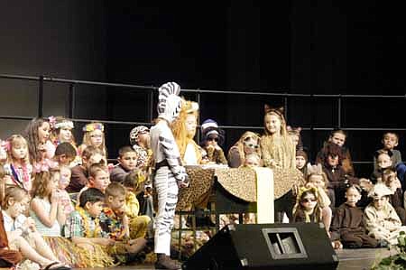 At the table figuring out how to bring order to the Jungle, are, from left, Stripes - Madilyn Schmidt, King Leo - Dillon Wood and Spots - Myra Silvey.
