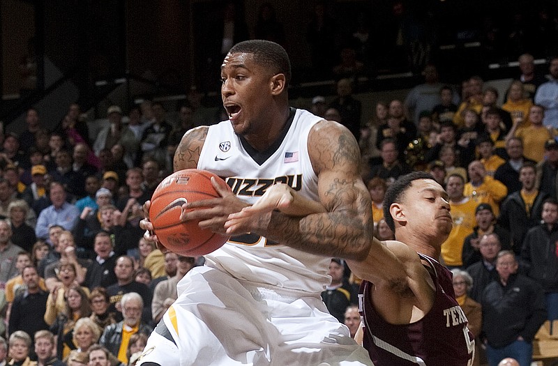 Missouri's Earnest Ross is fouled by Texas A&M's Jordan Green as he pulls down a rebound in the final seconds of Wednesday night's game at Mizzou Arena