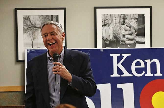 In this Jan. 24, 2014, file photo, Weld County District Attorney Ken Buck speaks to supporters during a campaign dinner event at Johnson's Corner, a truck stop and diner in Johnstown, Colo. Republican primaries this election year will be a crucial test for the Tea Party movement as the GOP establishment has aggressively challenged tea party-backed candidates in Kentucky, Kansas, Idaho, Mississippi, Michigan and elsewhere. Tea party-affiliated Buck, who lost a close Senate race in 2010, stepped aside to run for the House this week while more mainstream Rep. Cory Gardner launched a Senate bid in a political deal.