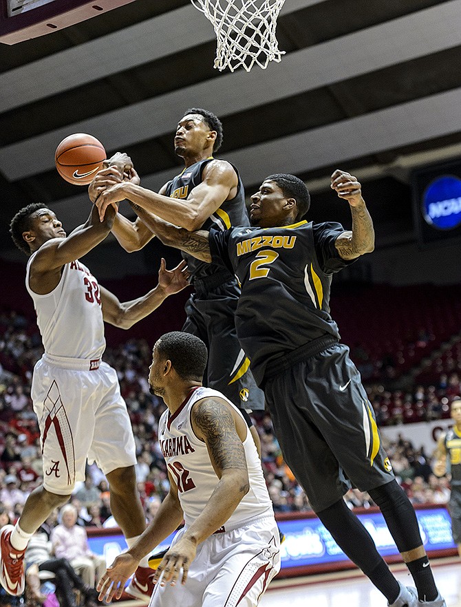 Missouri forward Tony Criswell (right) won't be making the trip to the Southeastern Conference Tournament that starts Wednesday in Atlanta, Ga.