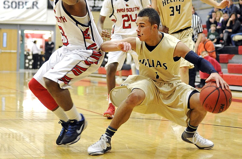 Helias' Isiah Sykes, shown operating against Raytown South during a game earlier this season, will lead the Crusaders against St. Charles in a sectional game tonight.