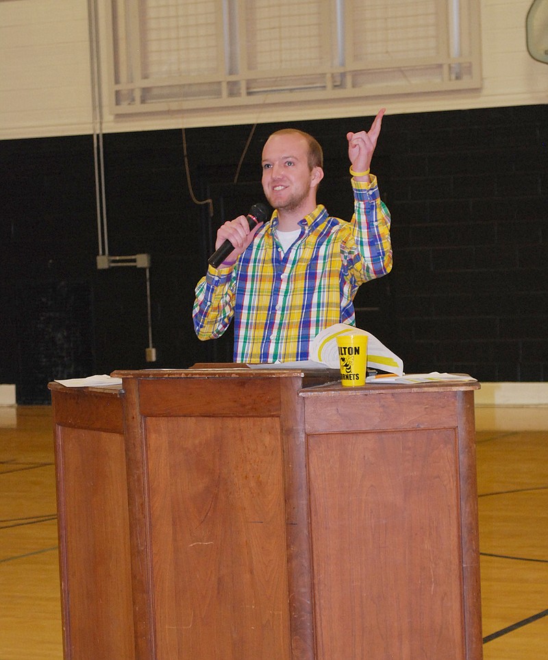 Fulton Middle School alumnus and Special Olympics volunteer Tyler Oestreich talks to students about the importance of having a good attitude and being nice Wednesday afternoon in the first of several activities organized by the FMS Student Council to promote the Spread the Word to End the Word campaign.