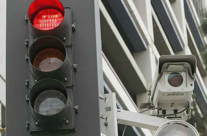 The Missouri Legislature is considering provisions adding restrictions to the use of red-light cameras for enforcement of traffic violations.