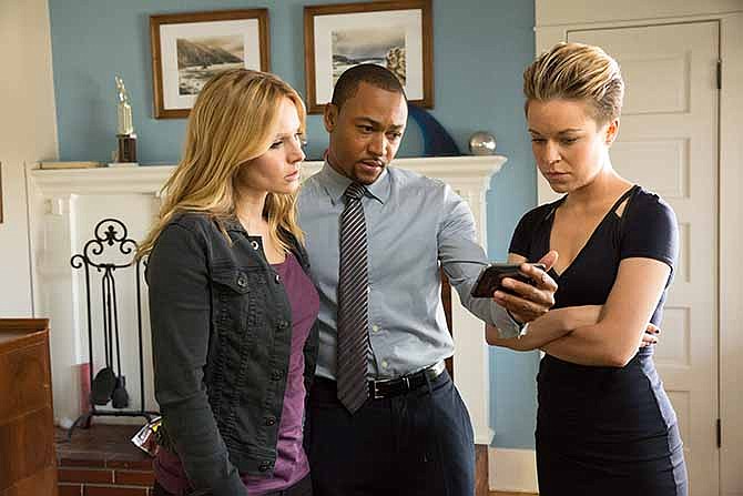 This image released by Warner Bros. Pictures shows Kristen Bell, from left, Percy Daggs III and Tina Majorino in a scene from "Veronica Mars."