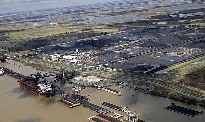 This Feb. 18, 2014, aerial photo from a flight provided by southwings.org shows the United Bulk Terminals in Devant, La., Tuesday, Feb. 18, 2014. Three environmental groups claim in a federal lawsuit that the coal terminal, south of New Orleans, is polluting the Mississippi River. (