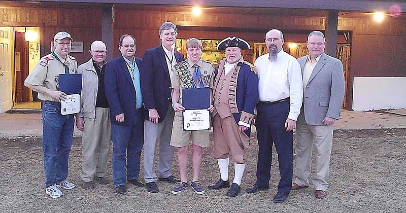 From left to right are Scoutmaster Eric Schroeter, Tom Holt, Cliff Olsen, Steve Newman, Allan Morris Burger, Earnie Mowry, Joe Coy and Dave Shaul at the SAR Recognition Monday, March 10.