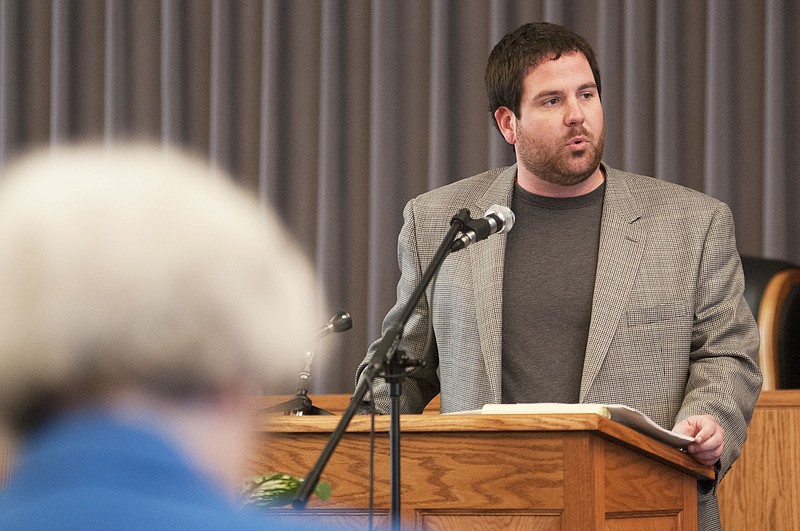 Ed Smith, safe energy director for the Missouri Coalition for the Environment, asks one of his four questions for representatives from the U.S. Nuclear Regulatory Commission Wednesday inside Fulton City Hall during the commission's meeting to discuss the Callaway Plant's draft supplemental environmental impact statement for license renewal.