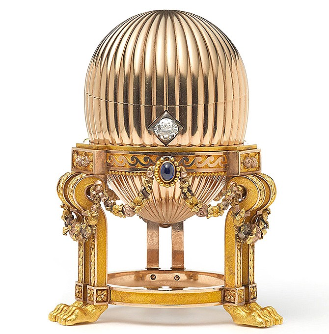 A gold ornament bought by an American scrap-metal dealer has turned out to be a rare Faberge egg worth millions.